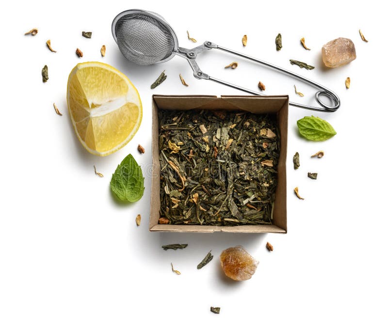 Green Tea with Natural Aromatic Additives and a Cup. Top View on White
