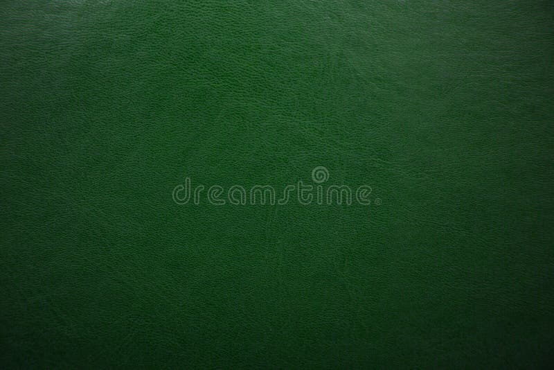 Green textured leather background. Abstract leather texture royalty free stock photos