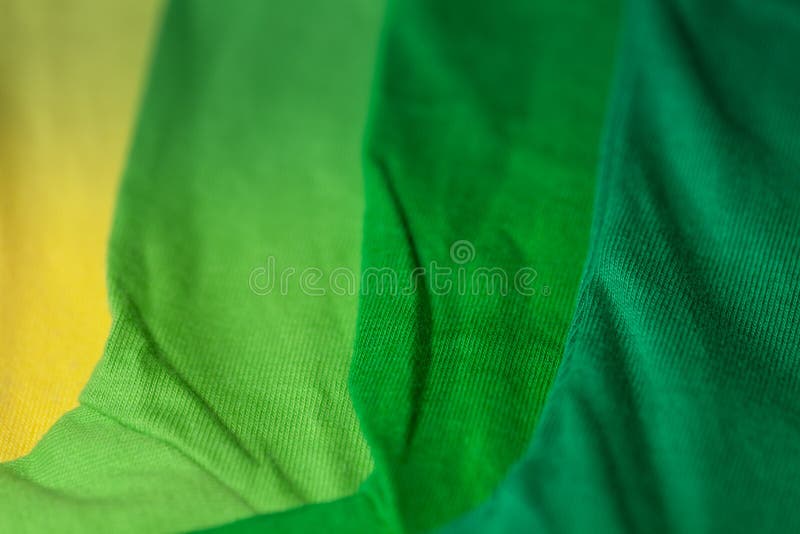 Green tone color color tee shirts. colorful of 100 percent cotton tee shirts in tee shirt factory