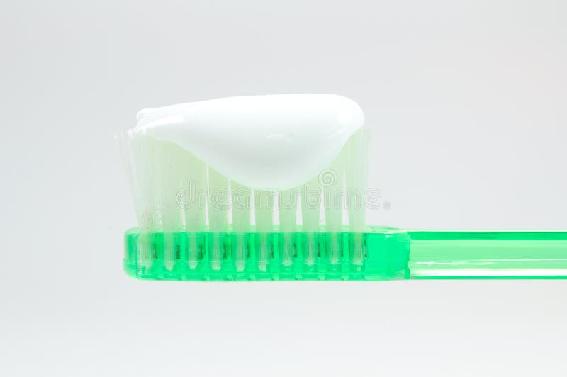 Green Toothbrush With Toothpaste Stock Photo Image of pharmacy