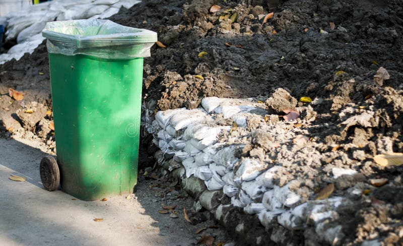 Green trash In the park, the concept of love the world stock images