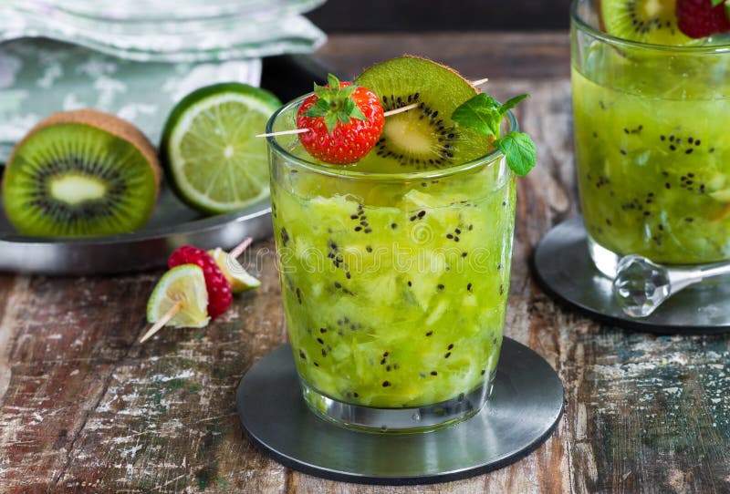 Green Vodka, Kiwi And Lime Cocktail Stock Photo - Image of kiwi ...