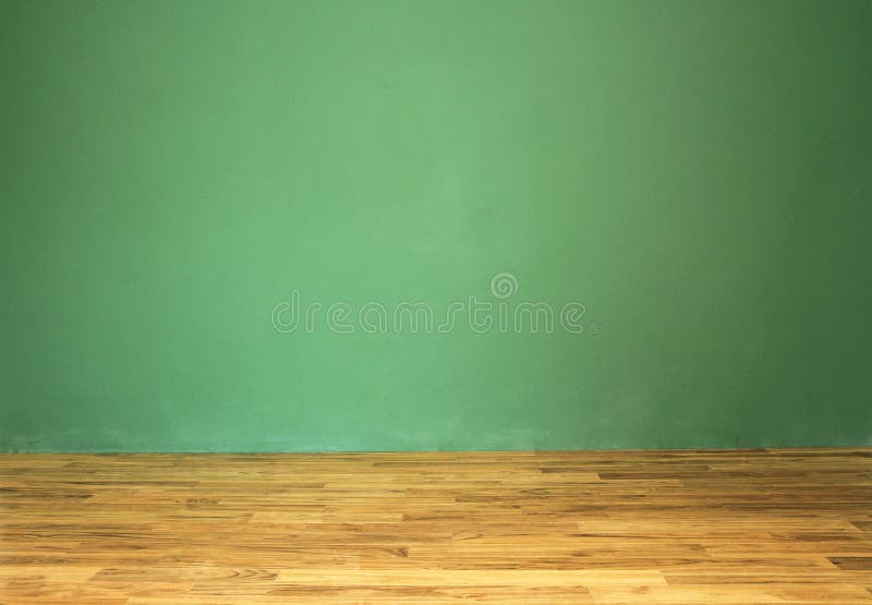 Green wall with wooden floor