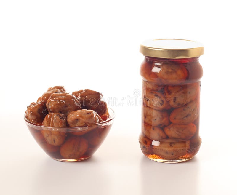 Green walnut jam royalty free stock photography