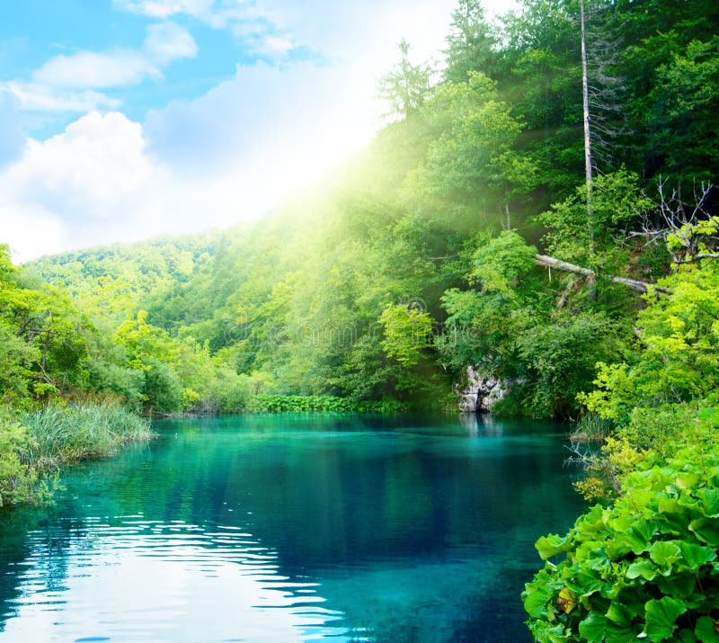 Green Water Lake and Sunset Stock Photo Image of sunlight, mountain 8015042