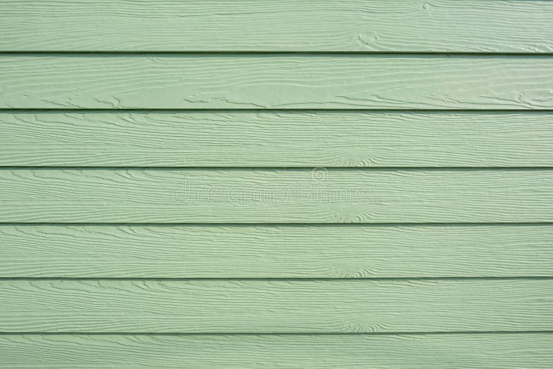 Green wood background texture in pastel tone royalty free stock photo.