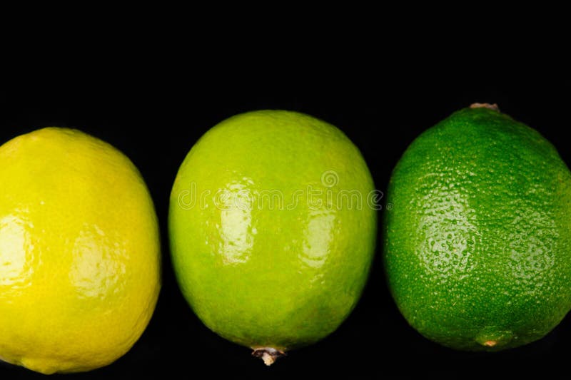 Green and yellow lemons stock image. Image of sweet 157064335