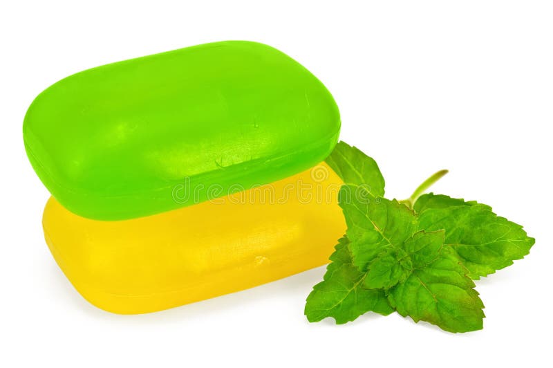Green and yellow soap with mint royalty free stock images