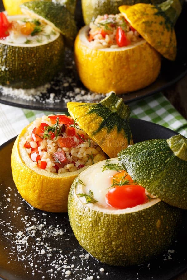 Green zucchini baked with eggs and yellow zucchini stuffed with