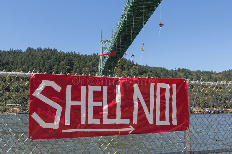 Greenpeace Activists Dangling Over St Johns Bridge with Sign