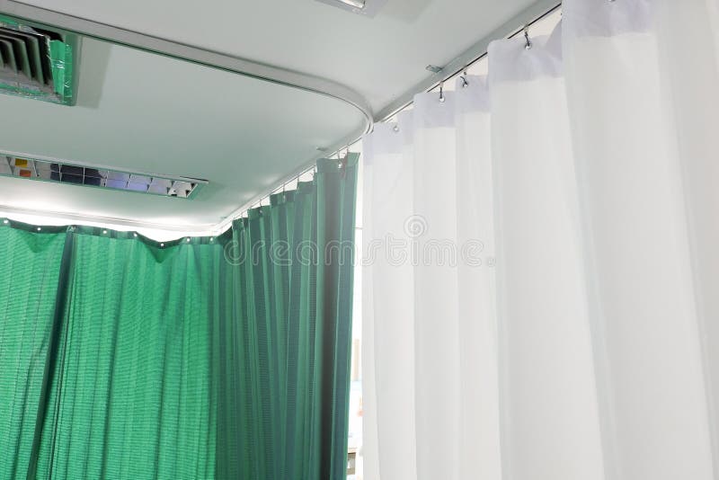 Greenâ€‹ andâ€‹ whiteâ€‹ curtainâ€‹sâ€‹ inâ€‹ theâ€‹ waitingâ€‹ roomâ€‹ atâ€‹ theâ€‹ hospital.