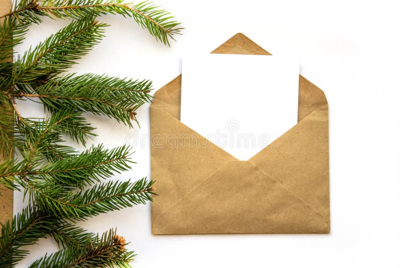Greeting card in a craft envelope on a white background with space for text. stock photo