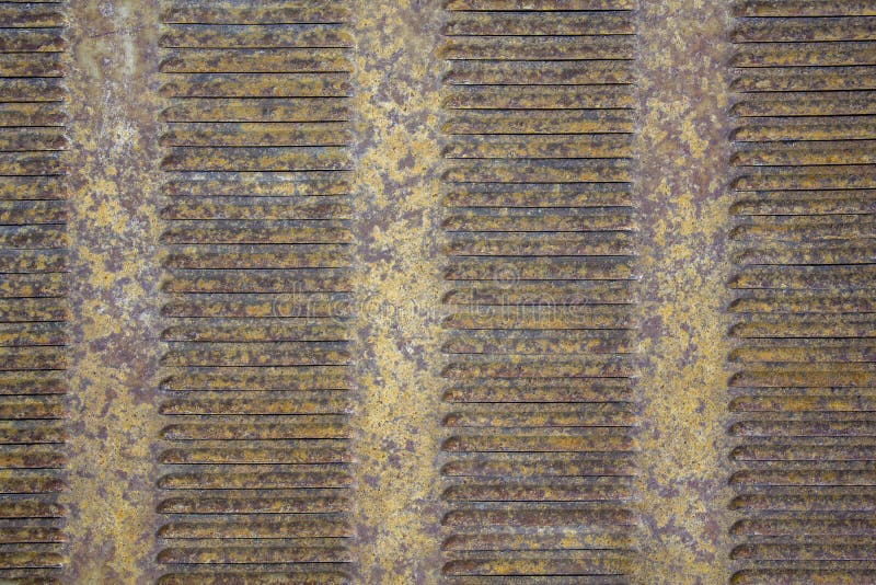 Grelhas marrons cinzentas amarelas oxidadas velhas da ventilação da grade do metal Textura da superf?cie ?spera imagens de stock royalty free Grelhas marrons cinzentas amarelas oxidadas velhas da ventilação da grade do metal Textura da superf?cie ?spera imagens de stock royalty free