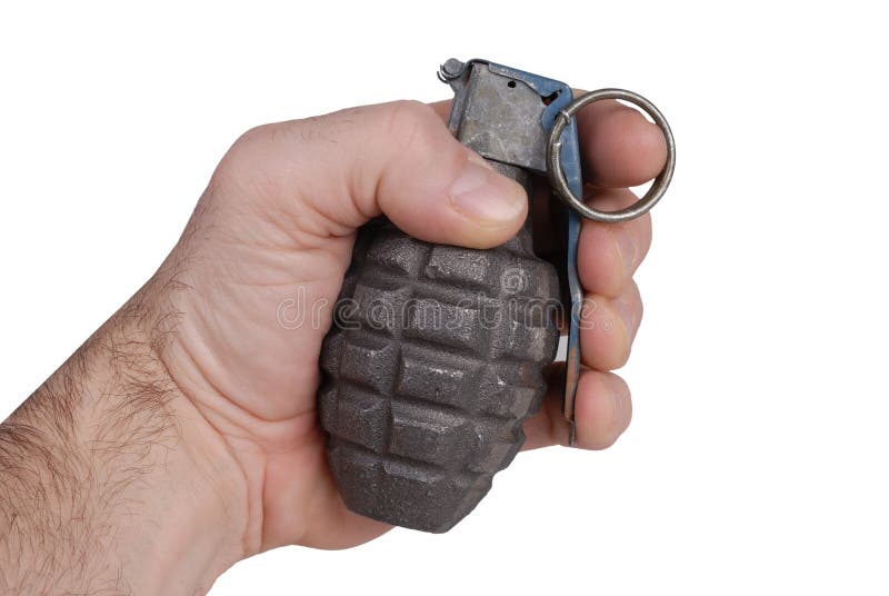 Hand grenade in a man's hand isolated over a white background. Hand grenade in a man's hand isolated over a white background