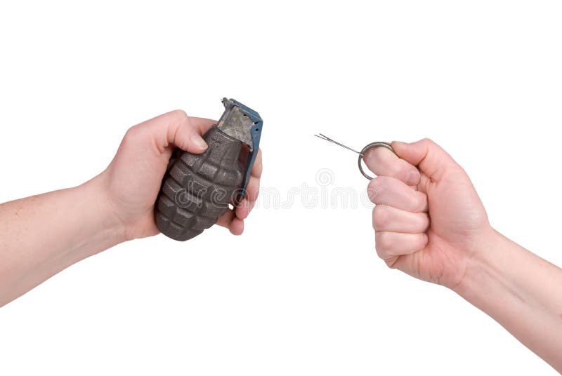 Hand grenade in a woman's hand with the pin pulled isolated over a white background. Hand grenade in a woman's hand with the pin pulled isolated over a white background