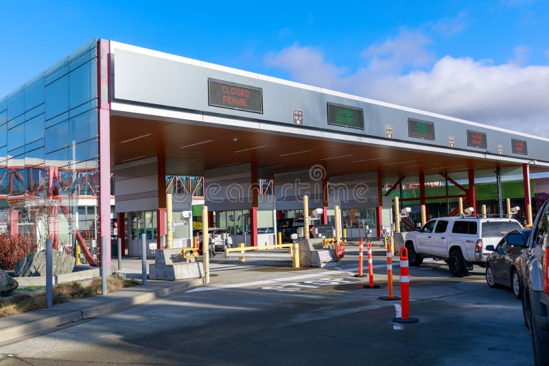 Grens de Canada-V.S. met auto die naar Vancouver gaan stock afbeelding Grens de Canada-V.S. met auto die naar Vancouver gaan stock afbeelding