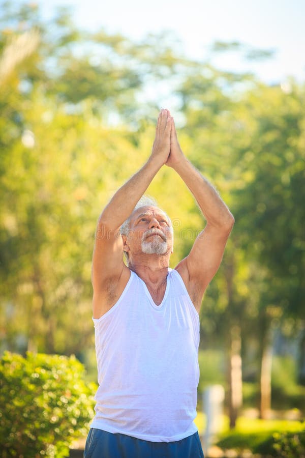 Grey Bearded Old Man in White Vest Shows Yoga Pose in Park Stock Image -  Image of beard, show: 102368047