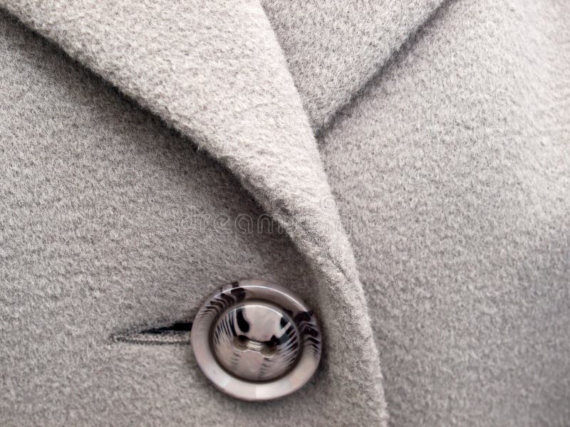 Grey button on coat stock image. Image of shelf, spring - 17082707