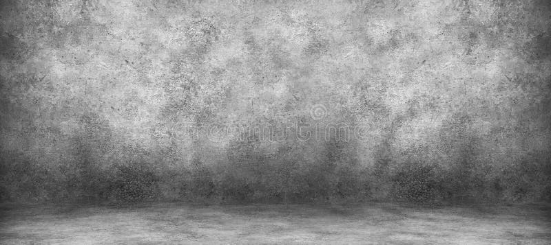 Grey cement wall and studio room with backdrops background. Blank product display stock photography