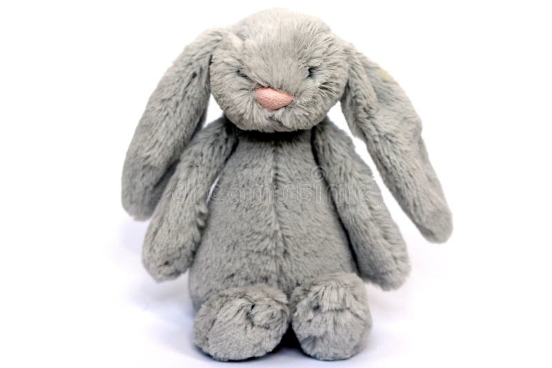 A grey fluffy rabbit toy stock image. Image of child - 87952855