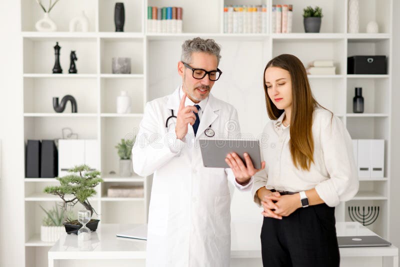 A conversation between a healthcare professional and a patient during appointment royalty free stock photo