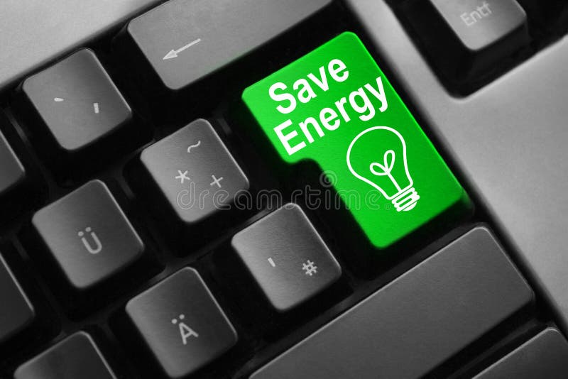 Grey keyboard green button save energy stock photo