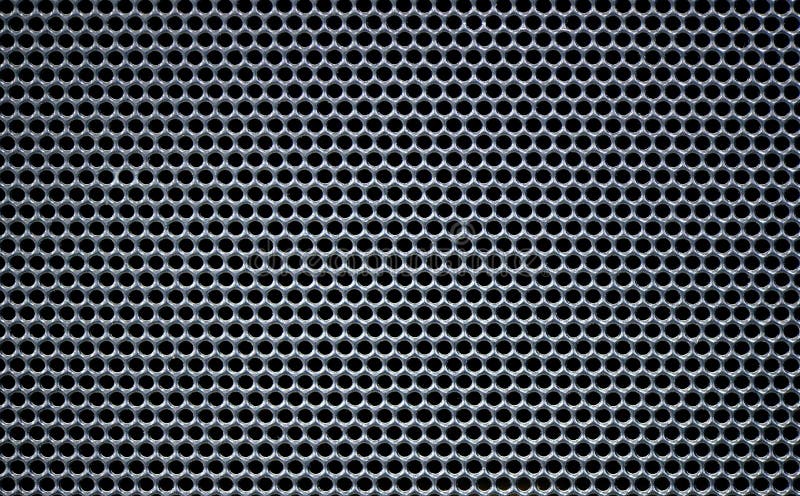 Grey Macro Metallic grid round holes hive texture royalty free stock image Grey Macro Metallic grid round holes hive texture royalty free stock image