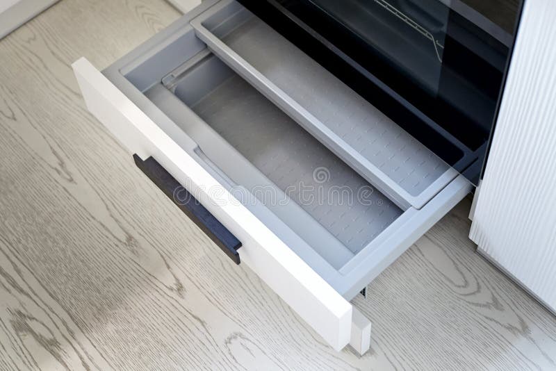 Grey Shelf Under the Oven stock photo. Image of oven 110016214