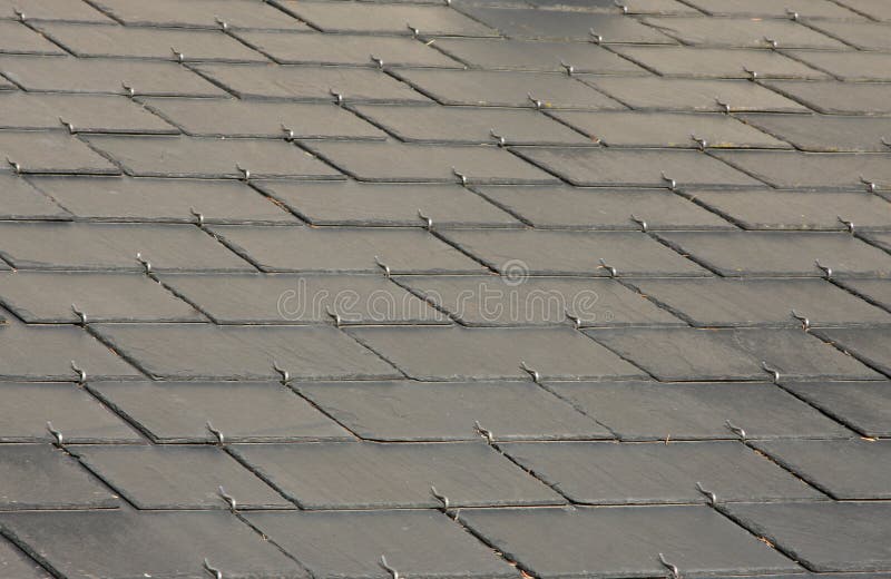 Grey slate roof royalty free stock images