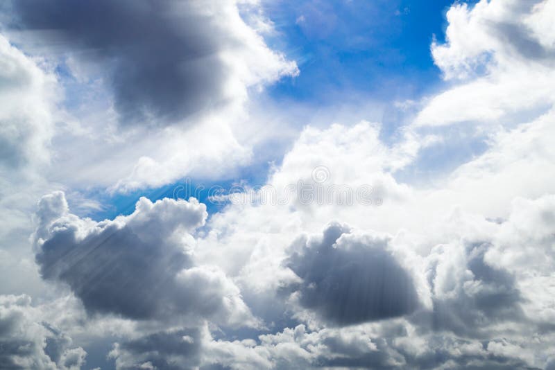 Grey and White Clouds. Beautiful Cumulus Clouds in the Blue Sky Stock
