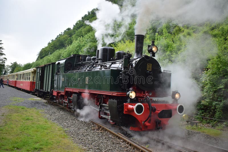 Vulkan Express is the former Brohltaleisenbahn, today a vintage railroad using historic engines and whole trains to transport people up the Eifel valley. The touristic route is popular, especially on steam train days many tourist travel far to join the trips. The vintage train connects the Rhine at Brohl with the Eifel at Engeln and Niederzissen with Burg Olbrück. Vulkan Express is the former Brohltaleisenbahn, today a vintage railroad using historic engines and whole trains to transport people up the Eifel valley. The touristic route is popular, especially on steam train days many tourist travel far to join the trips. The vintage train connects the Rhine at Brohl with the Eifel at Engeln and Niederzissen with Burg Olbrück