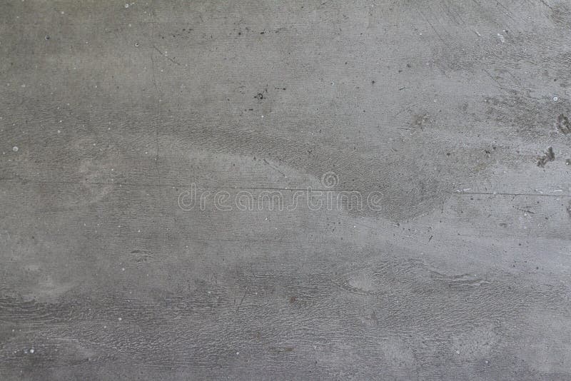 Grijze ruwe concrete cementmuur voor achtergronden