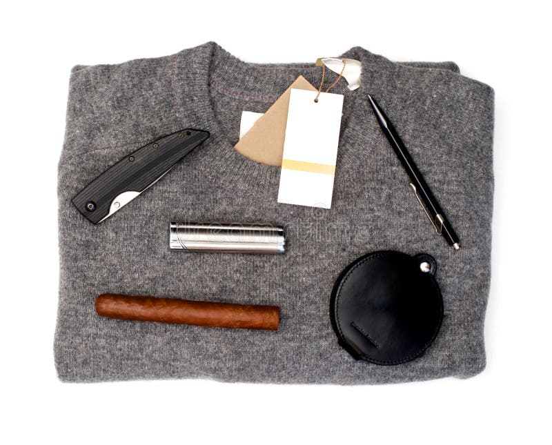 Grijze sweater met goederen over wit stock afbeeldingen Grijze sweater met goederen over wit stock afbeeldingen