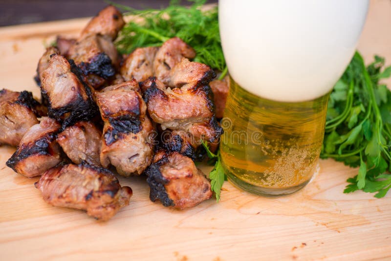 Grill meat, green and beer