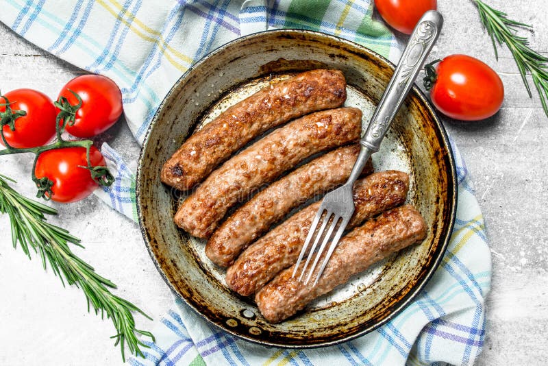 Grill sausages with tomato sauce