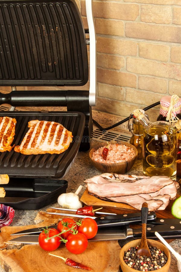 Grill Steak on an Electric Stove. Pork Neck Fried on Small Electric Grill.  Home Cooking. Healthy Barbecue. Catering To Friends Stock Photo - Image of  heat, chicken: 146073678