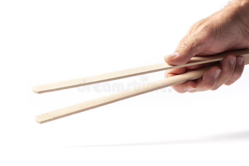 Grill Tongs in der Hand auf Weiß lizenzfreies stockfoto Grill Tongs in der Hand auf Weiß lizenzfreies stockfoto