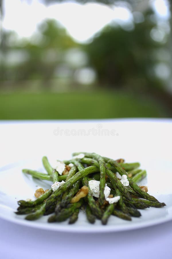 Grilled Asparagus with walnuts and goat cheese