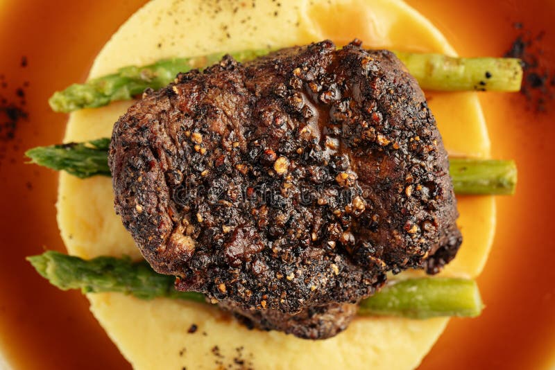 Pepper Steak with Mashed Potatoes and Asparagus Stock Photo Image of