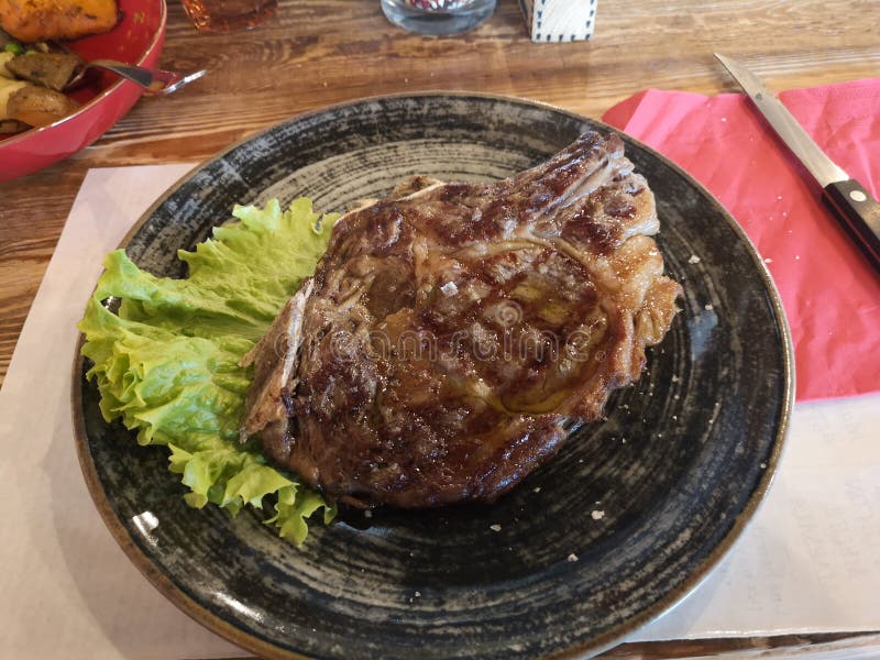 Grilled Beef Steak with Bone on a Serving Plate Stock Photo Image of