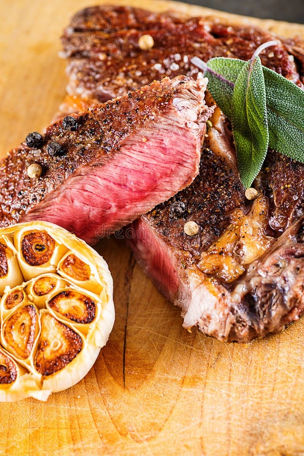 Grilled Beef Steak Fillet With Ingredients Like Sea Salt, Pepper, Herbs And Onion On Wooden ...