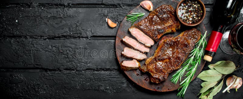 Grilled beef steak with red wine