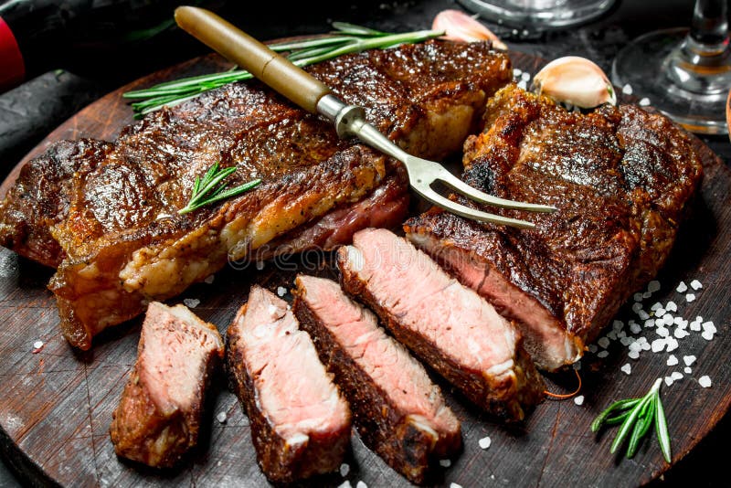Grilled beef steak with rosemary and spices
