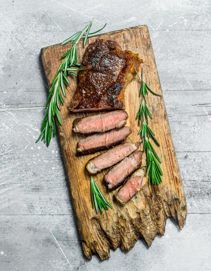 Grilled beef steak with rosemary and spices