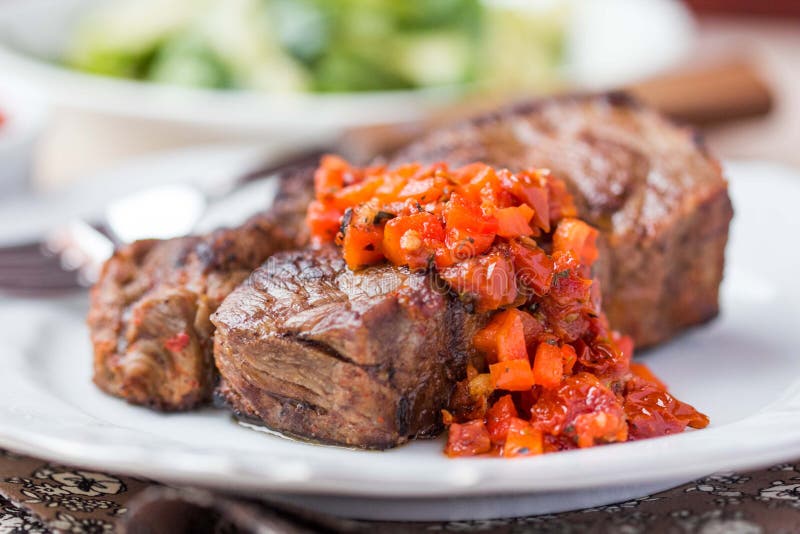 Grilled Beef Steak with Salsa Sauce Dried Tomatoes, Red Peppers Stock ...