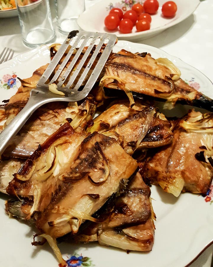Grilled Bonito Palamut Fish Slices at dinner table. royalty free stock image Grilled Bonito Palamut Fish Slices at dinner table. royalty free stock image