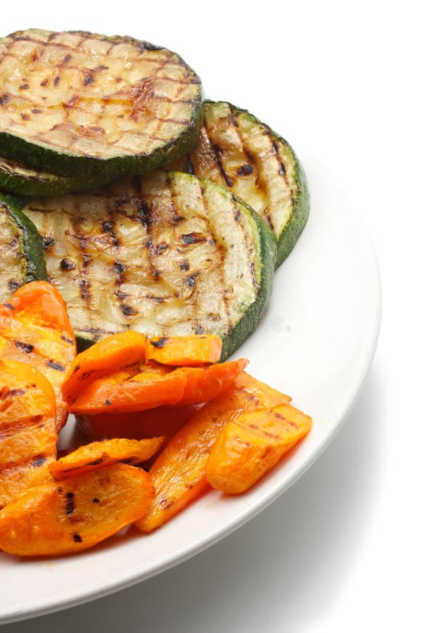 Grilled carrot and zucchini on а plate