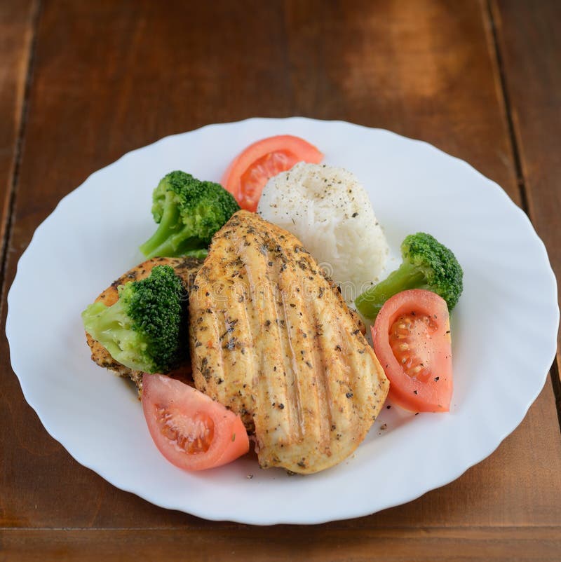 Fried Chicken Leg with Rice and Vegetables Stock Photo Image of