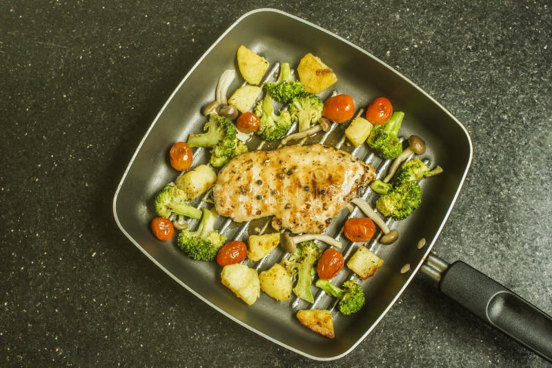 Grilled Chicken Breast Steak with Potatoes, Cherry Tomatoes, Broccoli