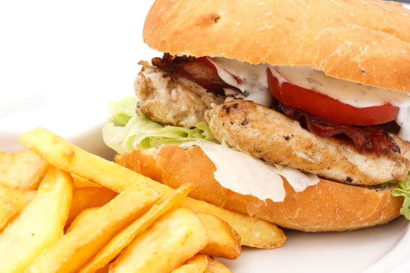 Grilled Chicken Burger With Chips On White Plate. Stock Photo Image